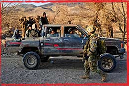 An MTF3 2RAR NCO patrols near PB Wali in the Mirabad Valley in Jan 2012